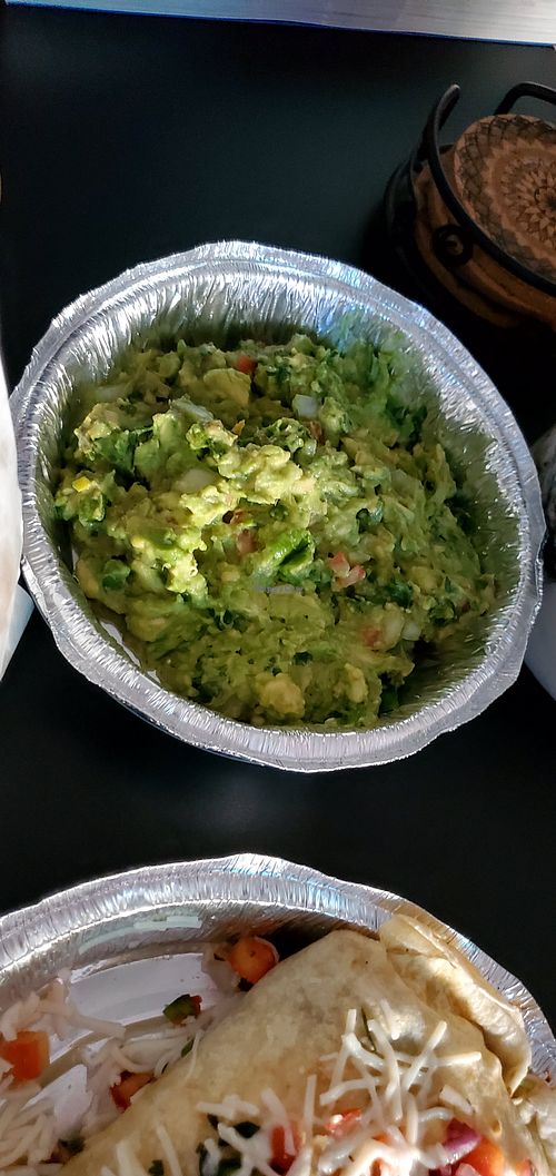 Tableside Guacamole. They gave 2 full bags of fresh tortilla chips with this. at Plaza Azteca in Marlton