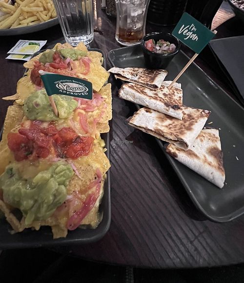 Nachos with cheese, guacamole & salsa. Black bean & cheese enchiladas   at Las Iguanas - Center Parcs Elveden in Brandon