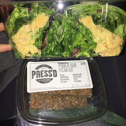 Chickpea collard wrap & pecan oat bars at Press'd - Plant Street Market in Winter Garden