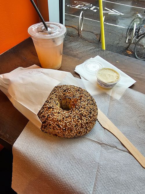 Everything bagel with vegan cream cheese and rose lemonade. Bagel was delicious, dip was good if you like lemon at Bbagels  in Montreal