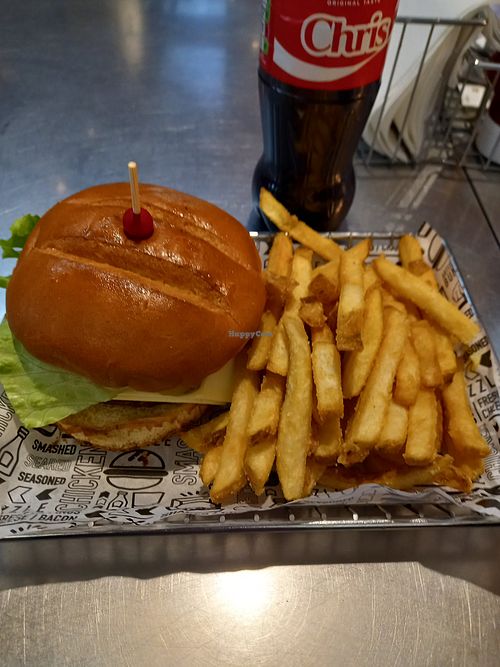 Vegan Burger with Vegan Cheeze, pickles, tomatos & lettuce with Chips on the side. at Smashburger in Newcastle Upon Tyne