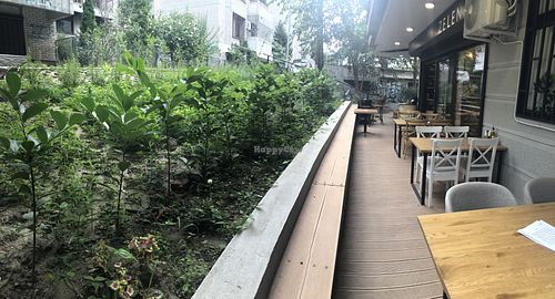 A panoramic shot of the herb garden and terrace  at Zelen in Belgrade