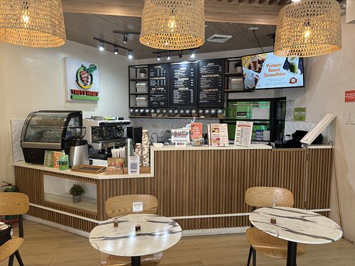 Beside Surge Fitness. Offerings include coffee, smoothie bowls, juices, pasta, sandwich  at Tasty Habit by Surge in Makati