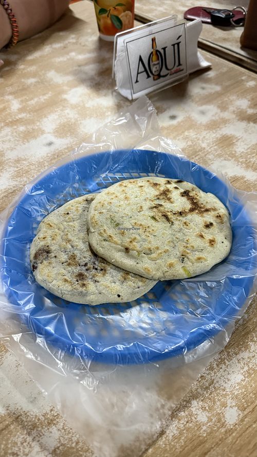 One pupusa with beans and one with squash  at Pupusería Zoila Olocuilta in Olocuilta