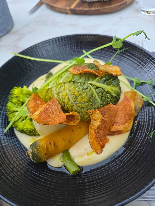 Cauliflower mousse , lentil, sweet potato and quinoa Dahl stuffed cabbage, roast vegetables. at Resto Bistrot l'Estanquet in Rocamadour