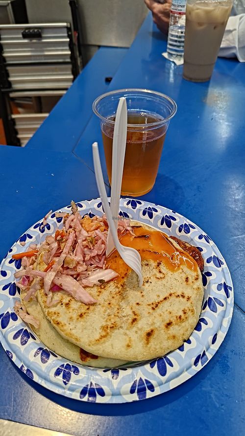 Pupusas with sauce at Sarita's Pupuseria in Los Angeles