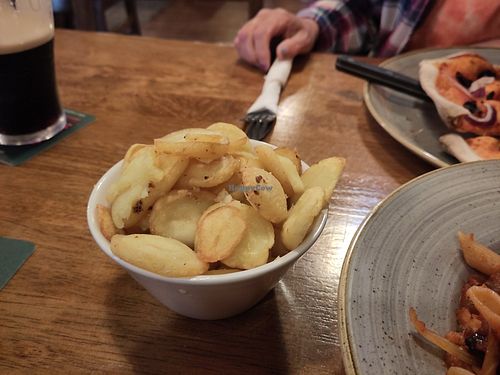 Fried sliced potatoes with garlic oil at Rosato's Bar & Restaurant in Moville