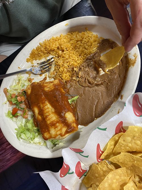 Veggie Chimichanga with no cheese and no sour cream. Covered in hot salsa!  at Molcajete's in Chadron