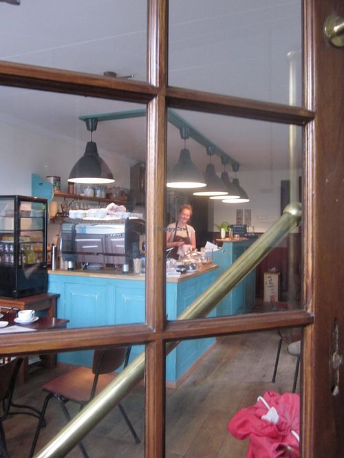 Looking into the cafe from the cute separate foyer... at Koffie ende Koeck in Amsterdam
