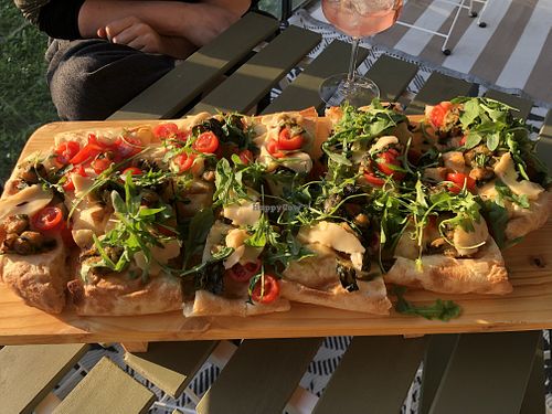 pinza with veggies and vegan sausage  at The Green Spot in Modena