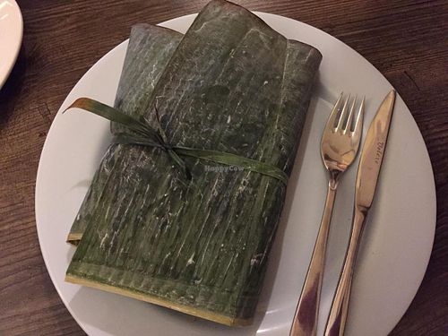 Mix of curries and rice wrapped in banana leaves at 7 Siri - Taste of Sri Lanka in Auckland