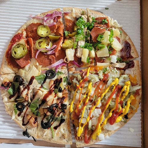 Vegan/GF "pizza flight:" westerdog, Mediterranean, brickhouse bee sting, and aloha bbq at Mitten Pizza Company  in Rockford