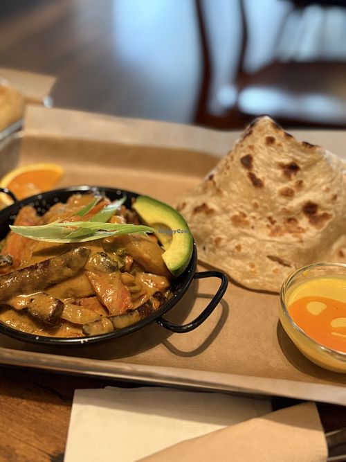 Tropical roti with vegan meat  at Aman Cafe in Oakland