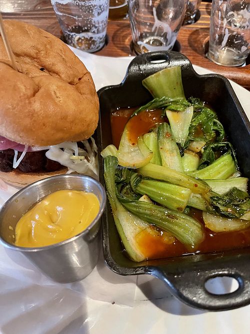 Falafel burger + spicy bok choy  at Wrecking Bar Brewpub in Atlanta