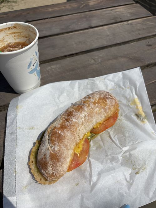 Vegan cheese, tomato and pesto ciabatta with soya iced latte   at Life's a Beach in Falmouth