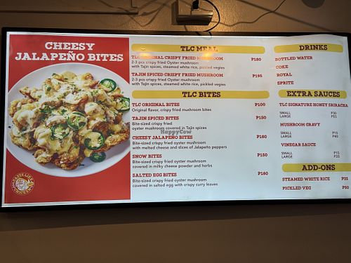 Only “original” and “spiced” flavors are vegan. Pickled veggies, gravy, and vinegar sauce also vegan.  at Taste Like Chicken in Baguio City