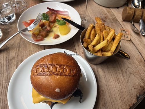 Hen of the woods mushroom burger, fries, tomato salad  at Fallow in South West London