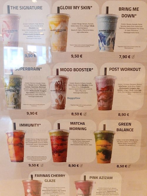 smoothie menu with 5 vegan options (vegan label next to price indicates it is vegan or can be made vegan) at Dr. Smusy in Cologne