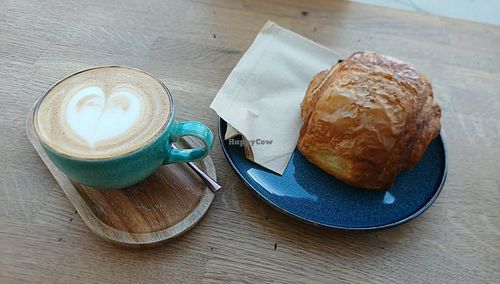 Pain aux chocolate and oat cap 😋 at 68 degrees   in North London