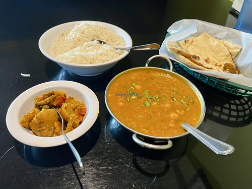 channa masala, pickle, roti, basmati rice - all vegan  at Best Taste Of India  in Roseburg