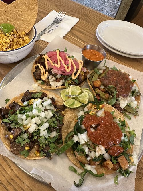 All four veggie tacos and corn off the cob without queso to make them vegan. Tasty!  at Taqueria Cinco in Jacksonville
