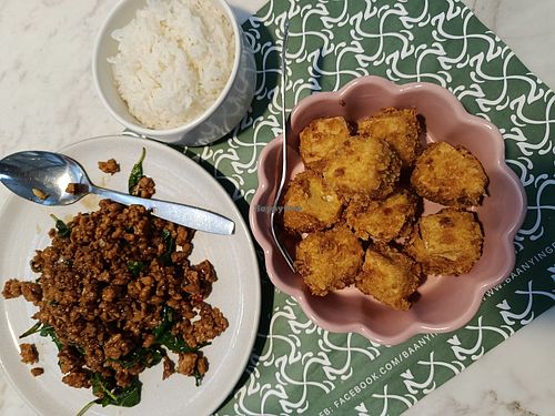 pad krapow, rice and crispy fried tofu. at Baan Ying - Dusit Suites Hotel in Bangkok