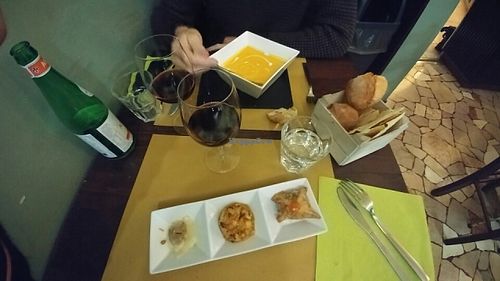 vellutata e 3 assagini. raviolo panzerotto tartare at Osteria al 55 in Milan