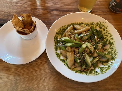 Tomato salsa and fried bread served with vegan gnocchi and asparagus.  at Olofmånsgårdens Skafferi in Goetene
