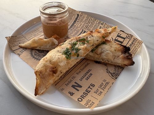 Complimentary Maltese Ħobża bread with traditional Biggilla (broad bean) dip.   at Pontus Restaurant in Zebbug