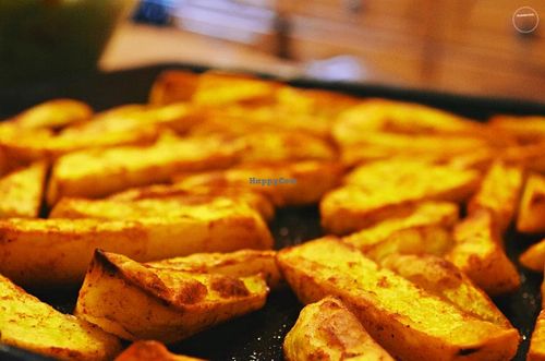 Side serve of hand cut wedges! Amazing dipping sauce! at Omassim in Santo Isidoro