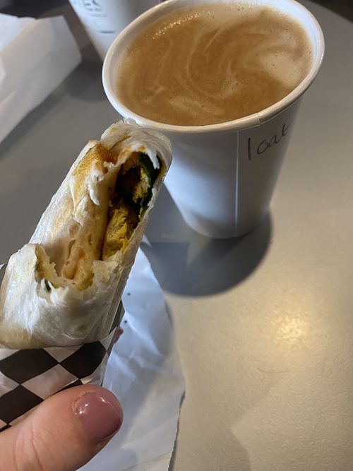 Turmeric Sunrise Wrap & oat latte   at Blondies Cafe in Canmore
