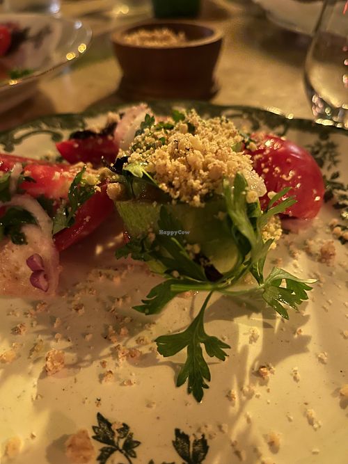 Georgian tomato and cucumber salad with walnuts. at Shavi Lomi - შავი ლომი in Tbilisi