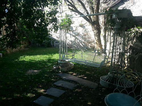 Detail of the relaxing garden at Em Carne Viva in Porto