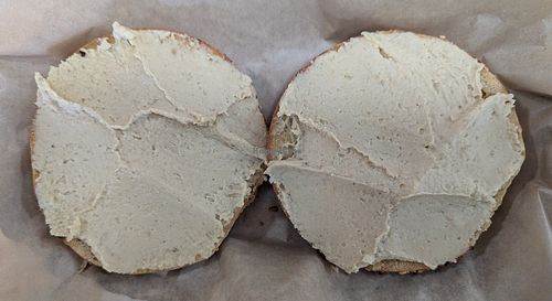 garlic bagel with hummus at Henry Higgins Boiled Bagels - Nob Hill in Portland