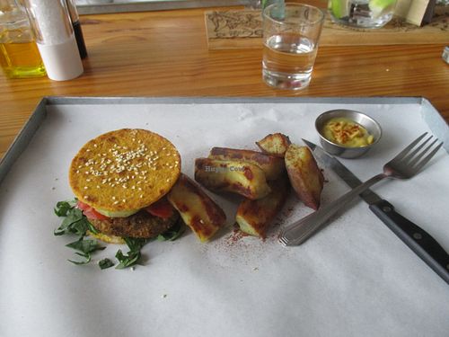 Delicious Alpha burger with sweet potatoes and coriander sauce. at Free Food in Johannesburg