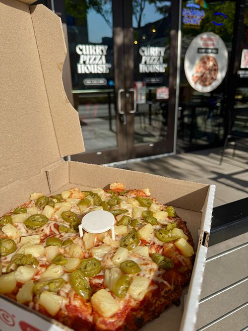 Vegan sauce, vegan cheese, pineapple & jalapeño pizza  at Curry Pizza House  in Foster City
