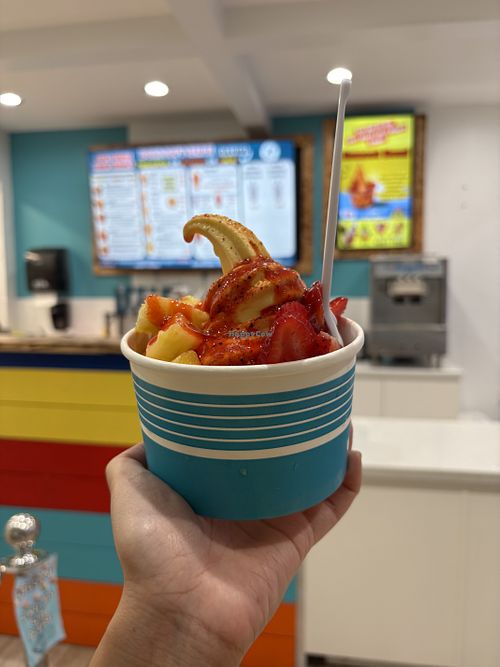 Sunset Bowl - Mango soft serve with mangos, strawberries, pineapple, chamoy and Tajin.   at KIC's Ice Cream in South Padre Island