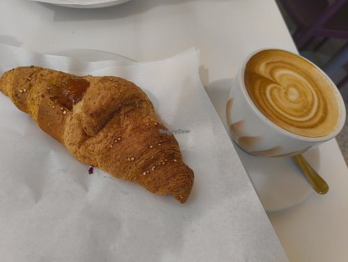Vegan croissant with jam and soy cappuccino at Pasticceria Bar Leonardi in Siracusa
