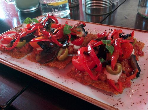Raw vegan pizza...yum!! at Super Natural Kitchen in Dubai