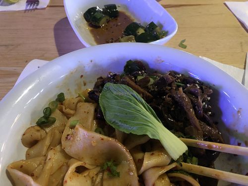 Biang Biang Noodles with Tofu + Mushrooms, Spicy Cucumber  at Yemyemy in Województwo Pomorskie