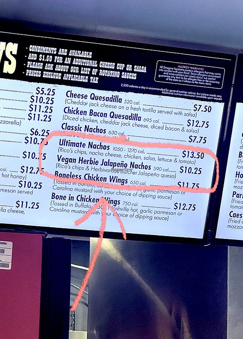 Vegan nachos with Herbivorous Butcher jalapeño queso   at Emagine Willow Creek in Plymouth