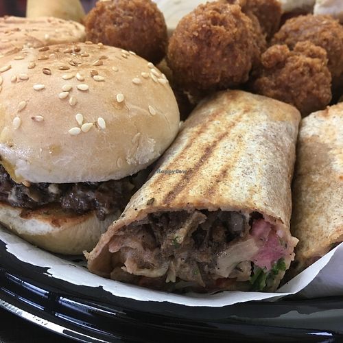 Plateau d'essai (sandwich traditionnel, sandwich philly, sandwich raffi, environ une douzaine de falafels et samosas) at 57 Cals in Laval