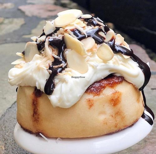 Caramel Frosting, Toasted Coconut, Almonds & Chocolate Sauce! at Cinnaholic in New York City