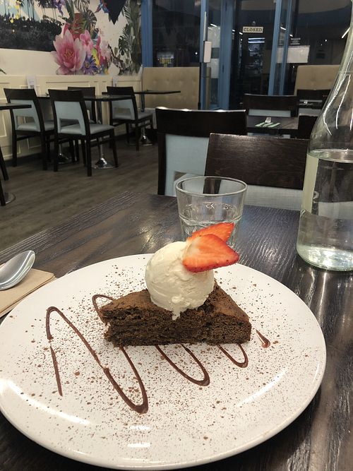 Banana cake with ice cream YUM  at 222 Vegan Cuisine in West London