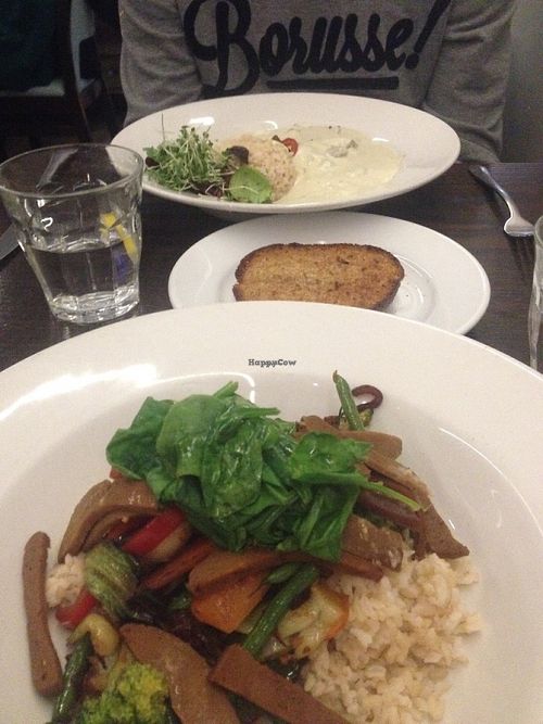 Bottom: Ben’s Special with rice and seitan. 
Middle: Garlic bread side
Top: Seitan Stroganoff  at 222 Vegan Cuisine in West London