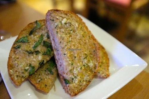 Bread, with garlic and oil and herbs. at 222 Vegan Cuisine in West London