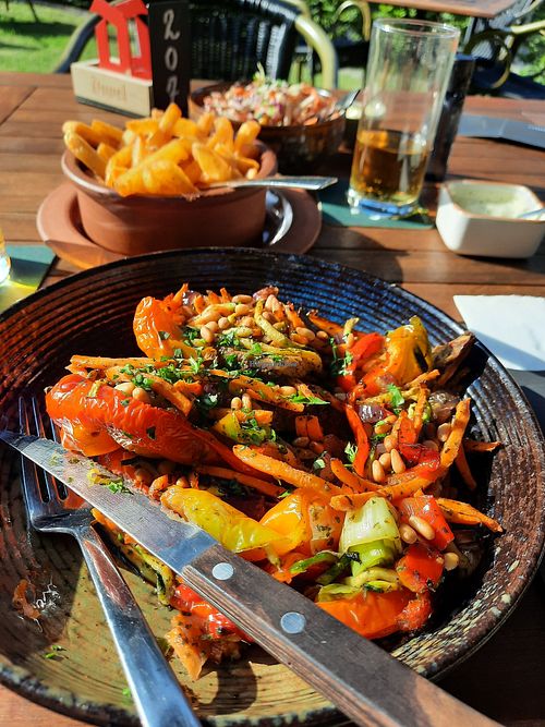 Stuffed pepper, with behind it chips/fries and a kind of coleslaw. at Het Muldershuis in Gelderland