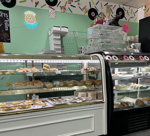 The vegan donuts are in the case on top of the refrigerated items.  at Daydream Donuts Café in Prince George