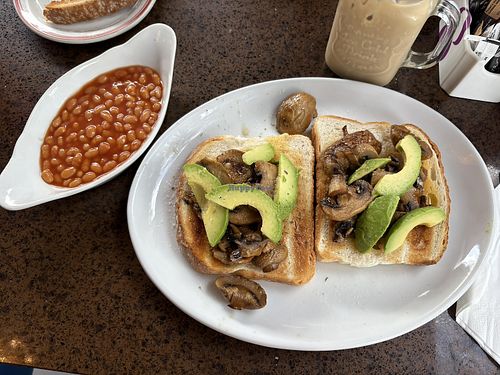 Avocado and mushrooms on toast - extra beans  at Leah's Bistro in Gillingham