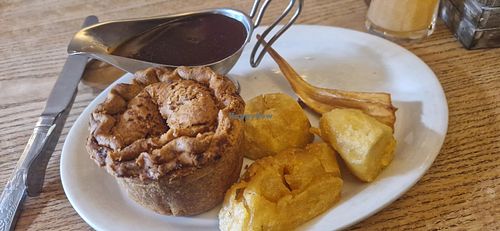 Thai pie with roast potatoes at White Horse Exning in England